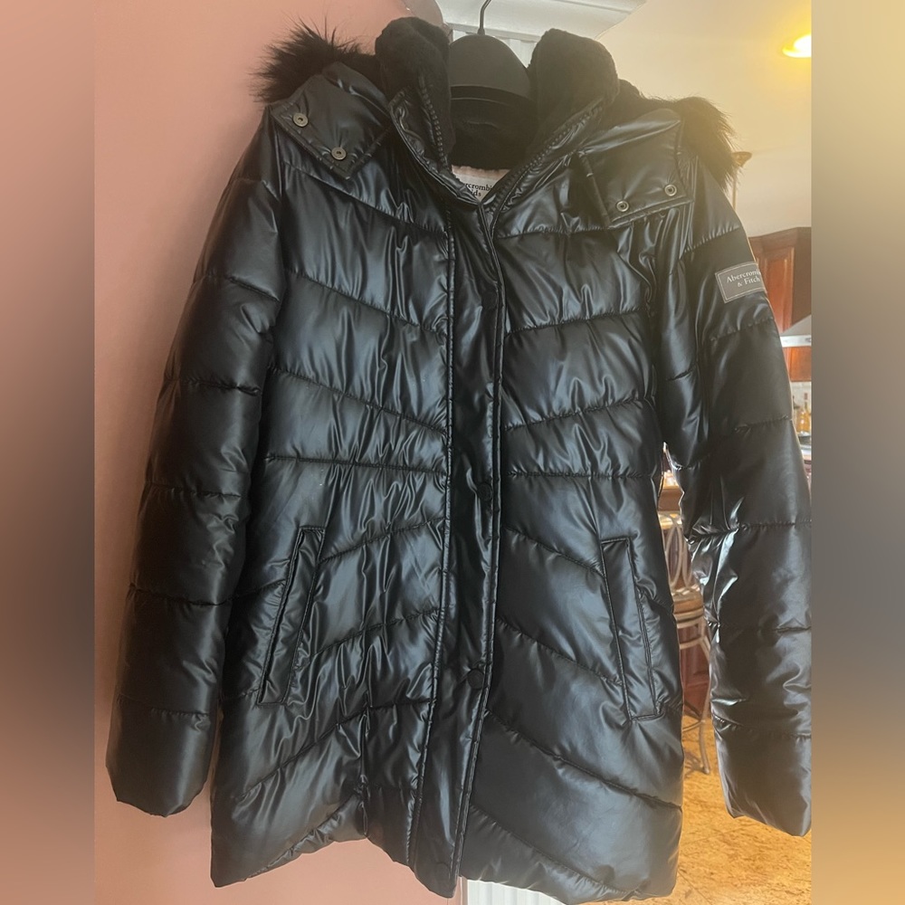 Cozy faux fur coat for girls. Worn a few times. Like new but missing belt.